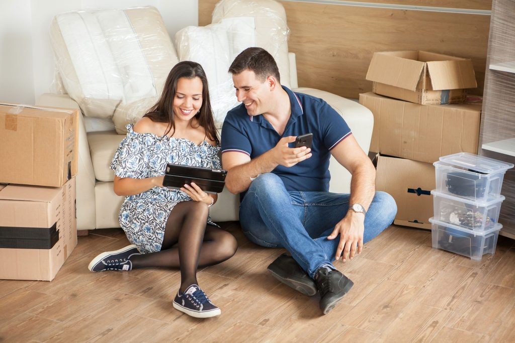 Wife showing her husband iPad