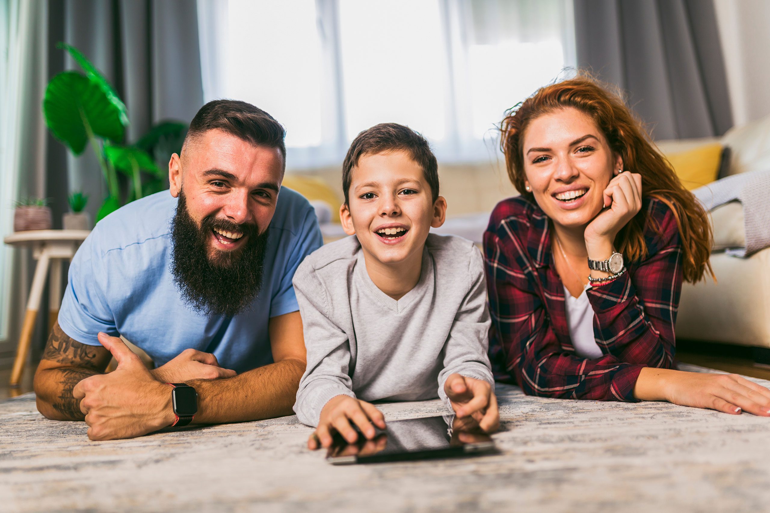 Family lying on the floor
